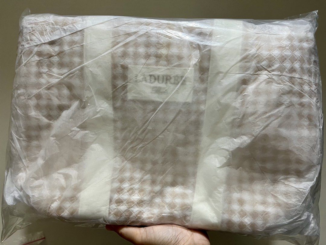 LADUREE Paris picnic cooler bag (Category: Tote Bags) located in Pasig City. Submitted by sagefields (Listing ID 1420349445, Image 2). Description: Bnew. RFS: received as a gift Still sealed in its onion paper and its original plastic packaging Comes with its original Laduree paperbag Insulated so it's perfect for aesthetic picnics and beach trips with friends and family! Dimensions: 45cm x 28cm x 16cm MOP: BPI Delivery: same-day rider only (buye
