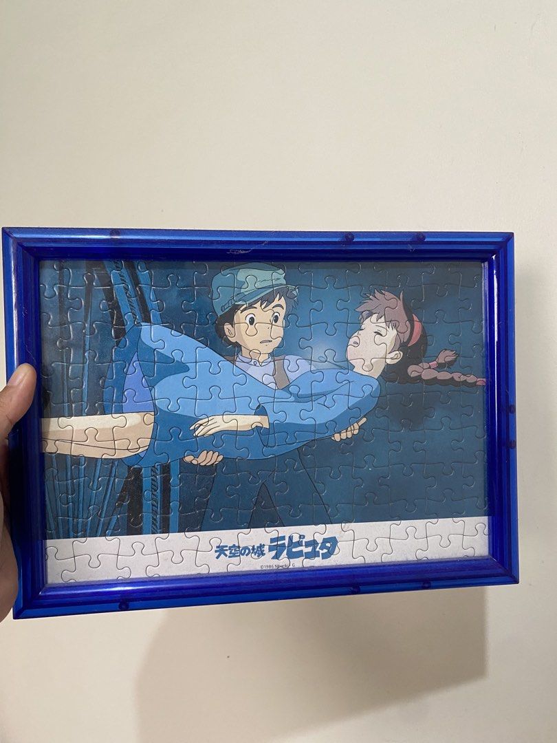 Laputa: Castle in the Sky Puzzle Frame (Category: Art & Prints) located in Manila. Submitted by k0pimonster (Listing ID 1431476085, Image 1). Description: - Framed Laputa: Castle in the Sky puzzle - Features Pazu and Sheeta - Copyright 1986 Nibariki G - Complete and ready to display - Comes in a blue frame.