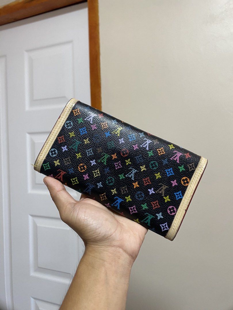 Louis Vuitton Multicolor Wallet (Category: Luxury Bags & Wallets) located in Cagayan de Oro. Submitted by martinduarte22 (Listing ID 1431549603, Image 2). Description: - Authentic Louis Vuitton multicolor wallet - Black exterior with iconic LV monogram print - Beige leather interior - Multiple compartments for organization - Secure snap closure - Includes "Louis Vuitton Paris Made in France" stamp - Minor signs of wear on the interior.