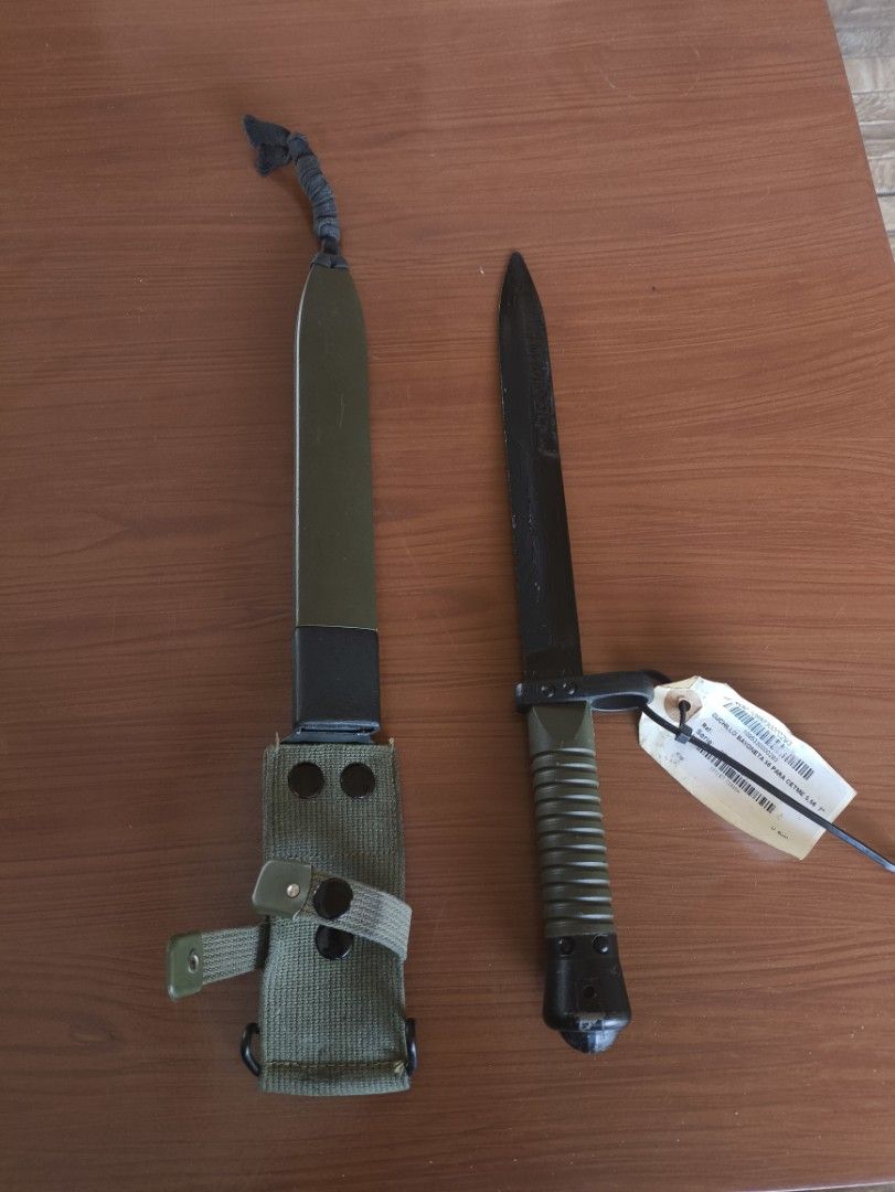 Military Bayonet with Scabbard (Category: Knives & Chopping Boards) located in Manila. Submitted by fpawn (Listing ID 1431383769, Image 2). Description: CETME model L Spanish bayonet -CETME( Centro de Estudios Tecnicos de Materiales Especiales) is the Spanish design center for specialized materials and firearms -the blade profile features a SINGLE cutting edge with a LONG FALSE edge at the tip -the handle features an olive green plastic grip with