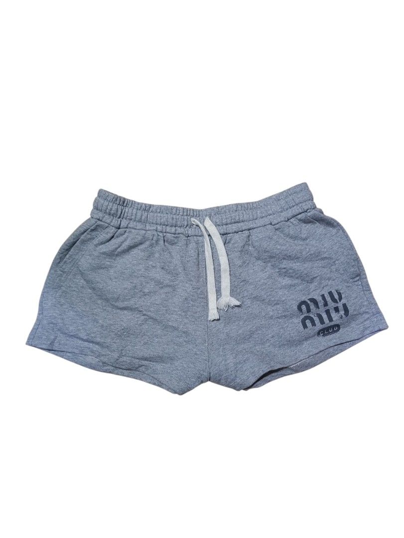 Miu Miu Club Shorts (Category: Shorts) located in Quezon City. Submitted by daniel_thrift05 (Listing ID 1431503569, Image 1). Description: - Gray Miu Miu shorts - Drawstring waist - Miu Miu Club logo on leg - Made in Italy - Size P - Two back pockets - Authentic with brand tag.