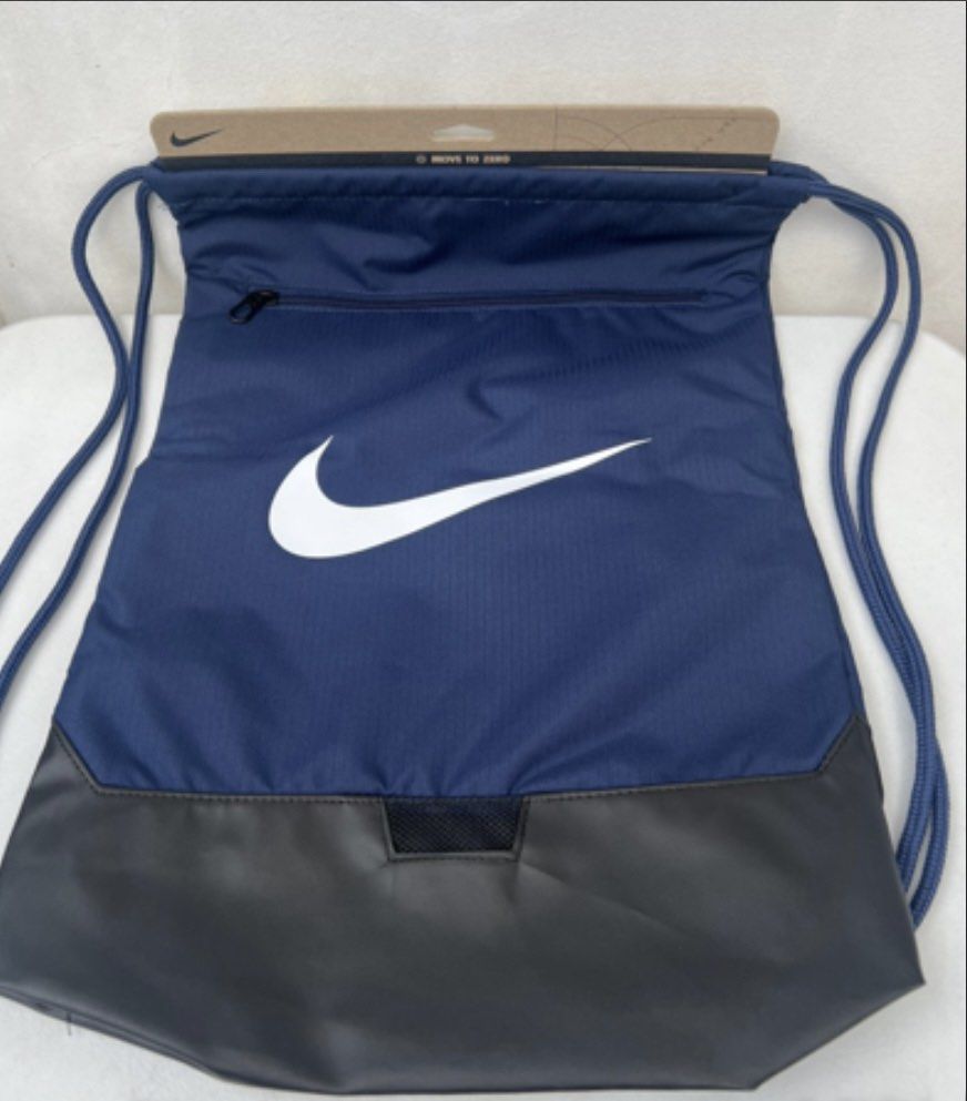 Nike Drawstring Bag (Category: Backpacks) located in Quezon City. Submitted by soohthings (Listing ID 1431502551, Image 1). Description: - Nike drawstring bag - Available in red and blue - Zippered pocket at the top front - Original ; bought directly in Nike store in US.