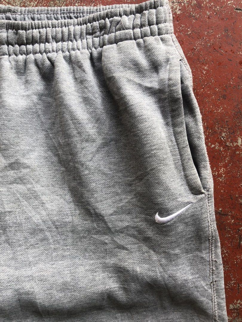 Nike Solo Swoosh open-hem fleece pants (Category: Joggers) located in Quezon City. Submitted by f1ysthrift (Listing ID 1431493521, Image 2). Description: Good condition Color rate 10/10 Issue pinholes Measurements Length 40" Waist 32" Leg Opening 9".