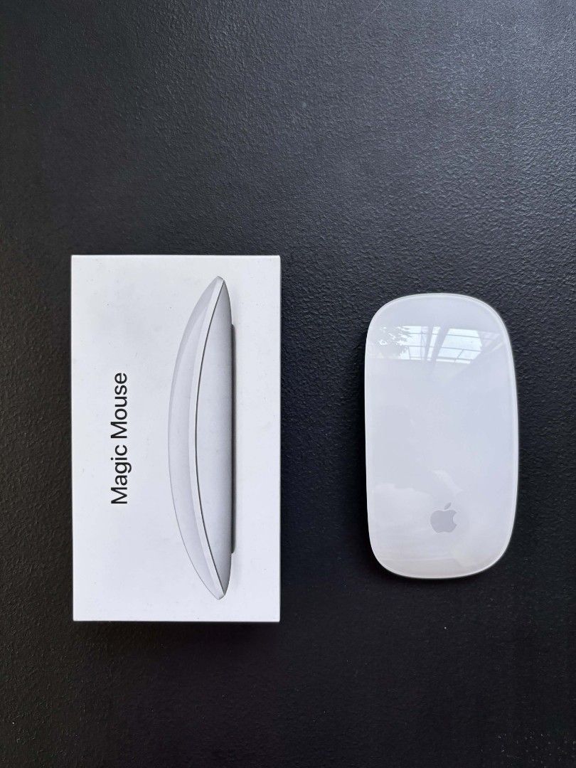 Original Magic Mouse 2 (Category: Mouse & Mousepads) located in Makati City. Submitted by av067t (Listing ID 1431396354, Image 2). Description: - Original Apple Magic Mouse 2 - Sleek white design - Used a few times - Includes original box - Comes with charging cable Will give discount if bought with other items Shipping via J&T, can do meetup in nearby areas 📍Carmona, Cavite.