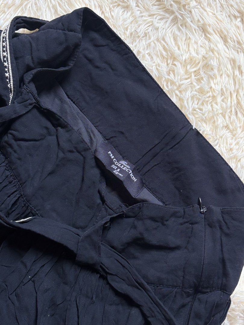 PM Collection Black Embroidered Skirt (Category: Skirts) located in Cavite. Submitted by prelovedbyacey (Listing ID 1431522476, Image 2). Description: - PM Collection black skirt - Embroidered details - Tie waist - Pleated design - Zipper closure - Lightweight fabric.