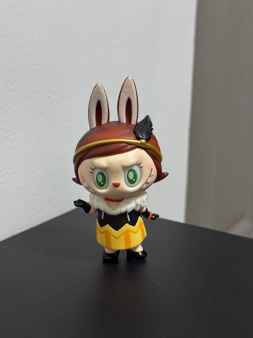 POP MART Spotlight 13th Anniversary Series - Labubu (Category: Designer & Blind Box Toys) located in Quezon City. Submitted by afpar (Listing ID 1431552951, Image 1). Description: - POP MART Spotlight 13th Anniversary Series - Labubu - Brown hat and ears - Black and yellow dress with white collar - Green eyes - Black gloves - Stands on a black surface - No box no foil.