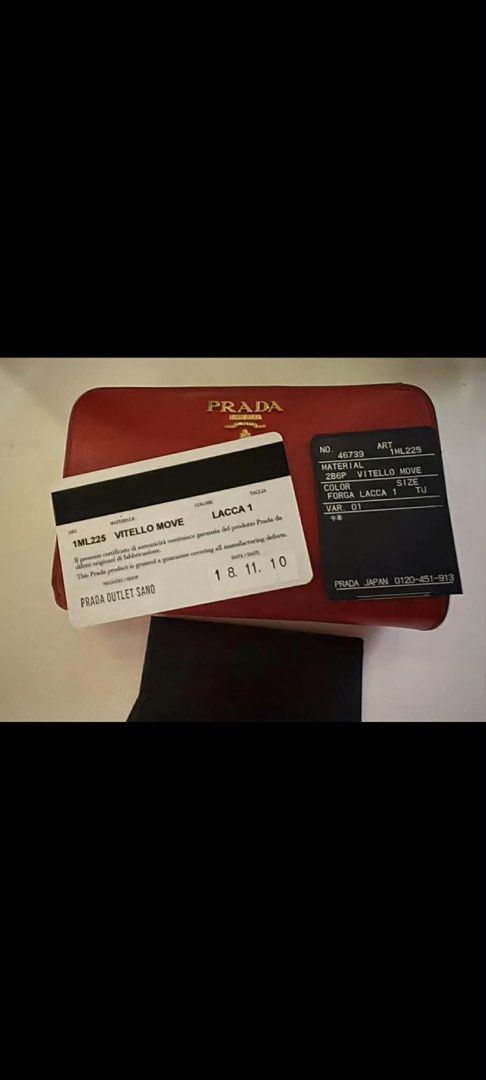 Prada Vitello Move Zip Around Wallet (Category: Luxury Bags & Wallets) located in Muntinlupa City. Submitted by megserafico (Listing ID 1431432750, Image 3). Description: - Authentic Prada zip around wallet - Red Vitello Move leather - Multiple card slots - Bill compartments - Zippered coin pocket - Includes authenticity cards - Gold-tone Prada logo - Red leather interior - Made in Italy.