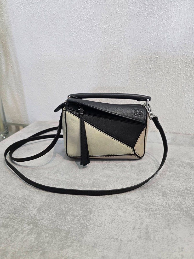 Preloved with Searchable Code💯✅ (Category: Luxury Bags & Wallets) located in General Santos City (Dadiangas). Submitted by braverabbit.67 (Listing ID 1431387324, Image 1). Description: Loewe mini puzzle bag 📌with Searchable Code💯✅ 𝗦𝘂𝗿𝗲 𝗯𝘂𝘆𝗲𝗿 𝗺𝗮𝘆 𝗿𝗲𝗾𝘂𝗲𝗦𝘁 𝗺𝗼𝗿𝗲 𝗱𝗲𝘁𝗮𝗶𝗹𝗲𝗱 𝗽𝗶𝗰𝗦 𝗼𝗿 𝘃𝗲𝗱𝗶𝗼! ‼️𝗙𝗢𝗥 𝗔𝗦𝗔𝗣 𝗥𝗘𝗣𝗟𝗬 𝗠𝗘𝗦𝗦𝗔𝗚𝗘 𝗨𝗦 𝗢𝗡 𝗙𝗔𝗖𝗘𝗕𝗢𝗢𝗞 NAME: LAPUZ OERLIE with Profile bckground Worn Red 