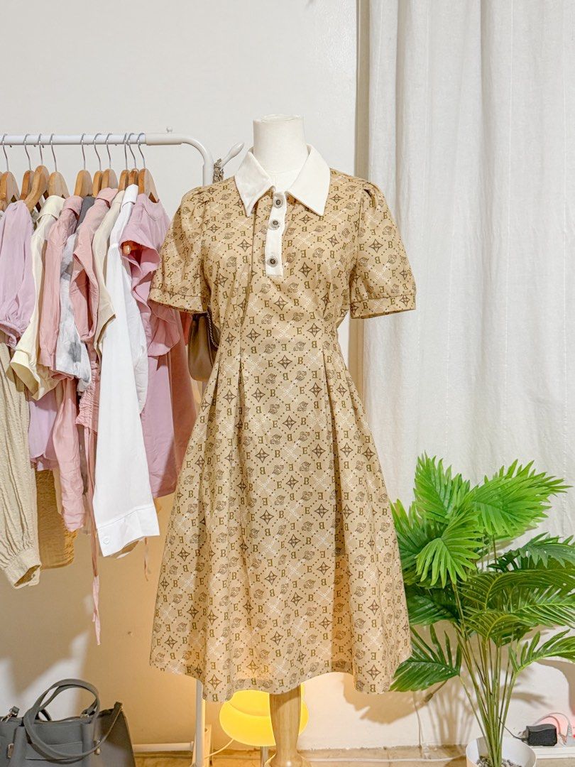 Printed Dress with White Collar (Category: Dresses) located in Rizal. Submitted by ktrncdln (Listing ID 1431438590, Image 1). Description: - Printed pattern dress - Classic white collar - Short sleeves - Flattering A-line silhouette - Button-up chest detail - Perfect for casual wear or vintage style.