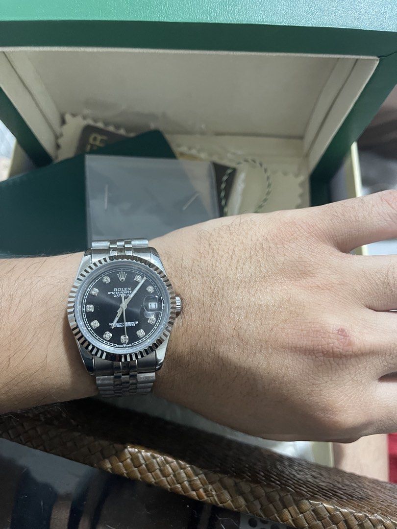 Rolex Datejust Diamond Dial (Category: Luxury Watches) located in Manila. Submitted by justacommoner23 (Listing ID 1431555132, Image 1). Description: - Rolex Datejust - Black diamond dial - Includes original box and papers - Extra links included - Stainless steel jubilee bracelet - Fluted bezel - A timeless classic.