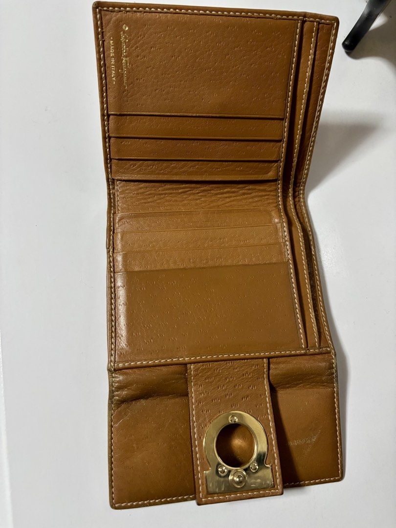 Salvatore Ferragamo Leather Wallet (Category: Luxury Bags & Wallets) located in Paranaque City. Submitted by tanjnetluxurypreloved (Listing ID 1431487366, Image 3). Description: - Authentic Salvatore Ferragamo wallet - Warm brown leather - Gold-tone clasp with logo - Multiple card slots - Coin compartment - Made in Italy.