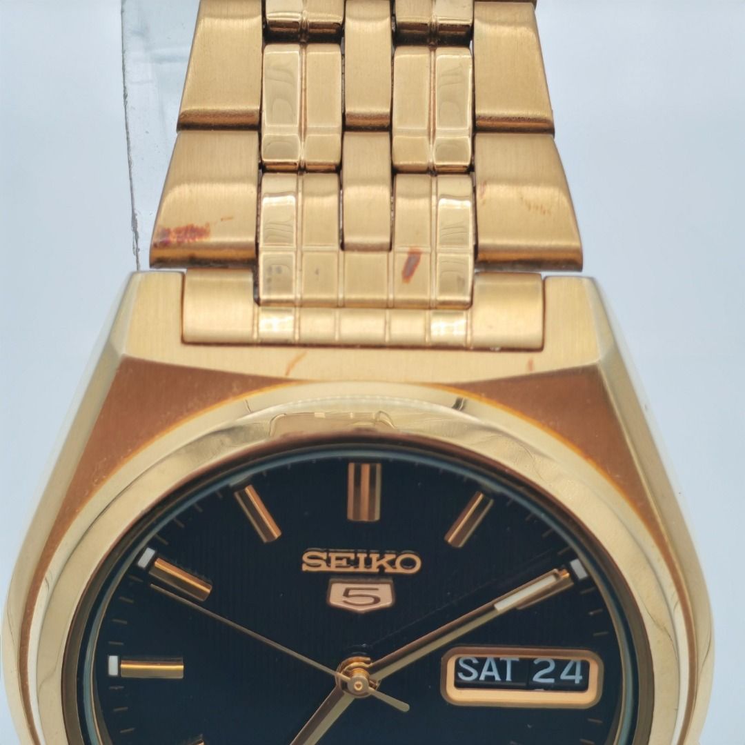 Seiko 5 Classic SNKL66K1 Watch - PLEASE READ (Category: Men's Watches) located in Taguig. Submitted by lukaemanuel (Listing ID 1431471424, Image 3). Description: Seiko 5 Classic SNKL66K1 – Black Textured Dial / Gold Tone Bracelet ---------- 📦 Tested working ❌ Reason for selling: Downsizing watch collection A clean and classic Seiko 5 SNKL66K1 with a black textured dial and gold tone case/bracelet. This model has a sharp vintage-inspired look wit