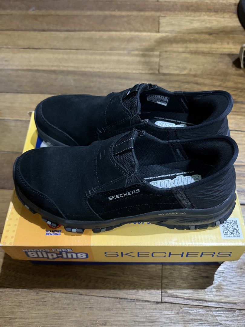Skechers Slip-ins: Hillcrest Trail (Category: Sneakers) located in Mandaluyong City. Submitted by joshlim (Listing ID 1431497141, Image 2). Description: Skechers Slip-ins Trail shoes in black, US Women's size 8. Features Air-Cooled Memory Foam and comes in its original box. Model: 180016/BBK. Mandaluyong Loc.