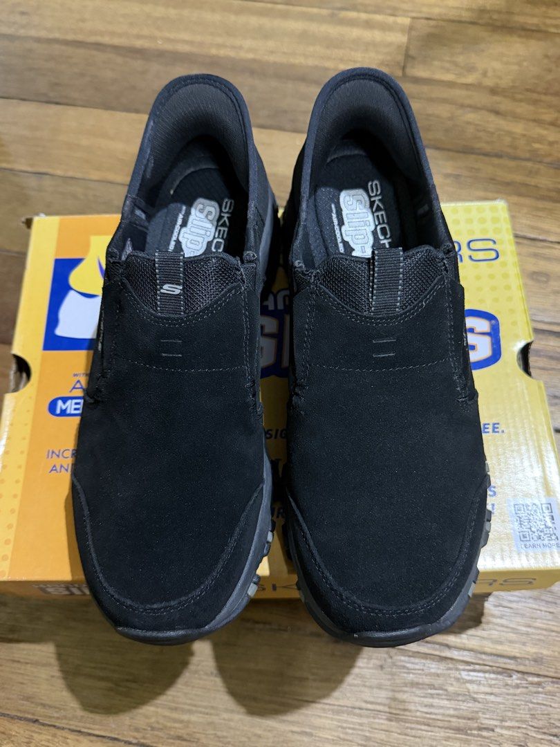 Skechers Slip-ins: Hillcrest Trail (Category: Sneakers) located in Mandaluyong City. Submitted by joshlim (Listing ID 1431497141, Image 3). Description: Skechers Slip-ins Trail shoes in black, US Women's size 8. Features Air-Cooled Memory Foam and comes in its original box. Model: 180016/BBK. Mandaluyong Loc.