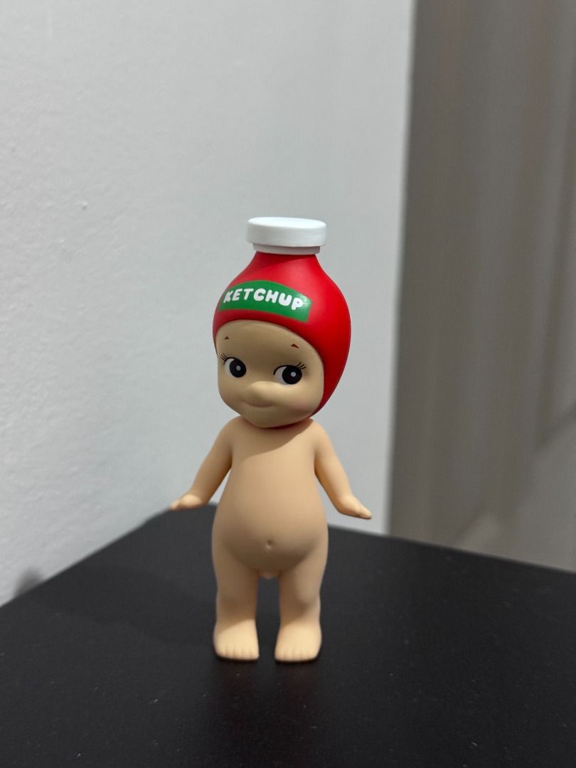Sonny Angel Snack Series - Ketchup (Category: Designer & Blind Box Toys) located in Quezon City. Submitted by afpar (Listing ID 1431538341, Image 1). Description: - Adorable Sonny Angel figurine - Features a ketchup bottle hat - Small white wings - Collectible item - Great for display - No box and foil.