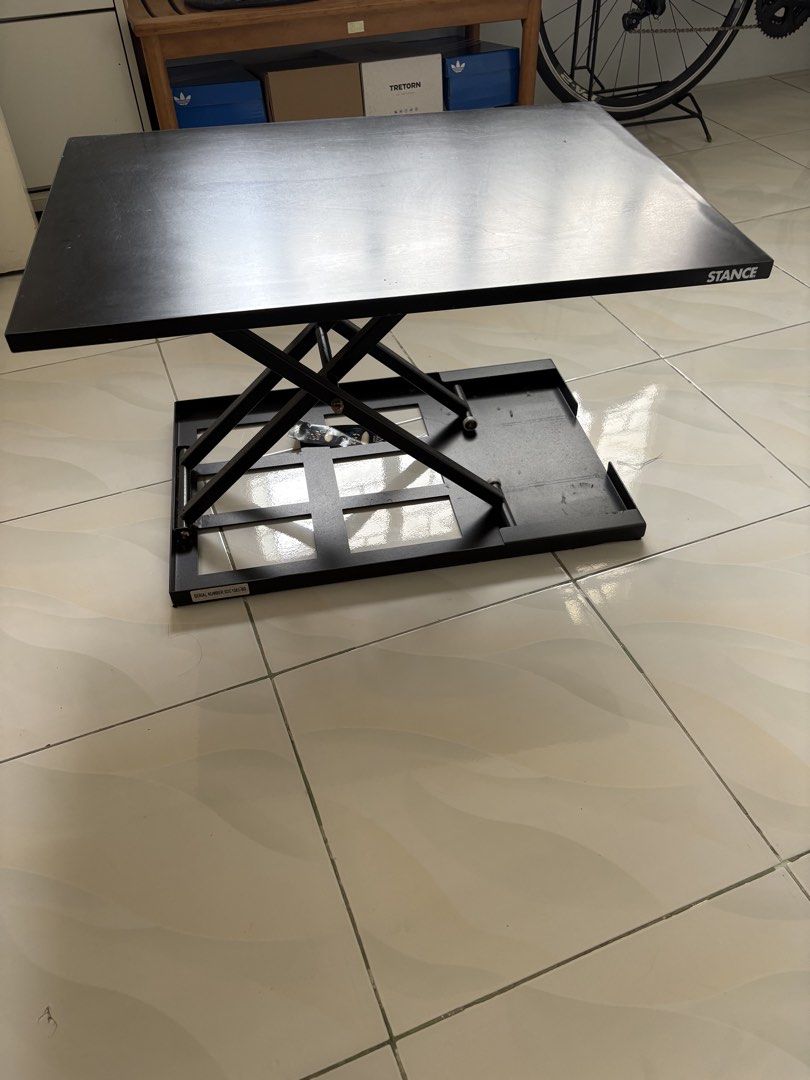 STANCE table riser (Category: Office Furniture & Fixtures) located in San Mateo. Submitted by hihelloida (Listing ID 1431406152, Image 2). Description: STANCE table riser -there’s a handle on the side for manual height adjustment -put it on top of your office desk and can be standing desk W: 51cm L: 71cm max height: 42cm folded height: 6.5cm.