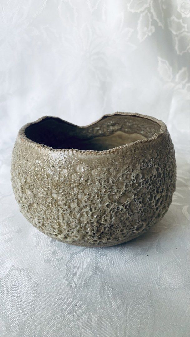 Stoneware Japanese chawan (tea bowl) (Category: Coffee & Tea Tableware) located in Quezon City. Submitted by smithram (Listing ID 1431460442, Image 3). Description: - stoneware - hand crafted - Textured exterior - Irregular rim - Neutral color - Smooth interior - Small pads on base - Measurements in photos.