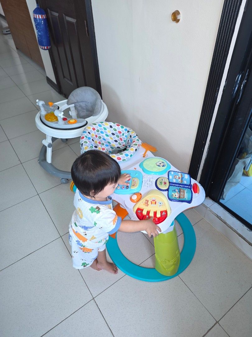 TAKE ALL Walker/360 rotate Activity Table (Category: Infant Playtime) located in San Juan City. Submitted by greega19 (Listing ID 1431480112, Image 2). Description: - 3-in-1 design: Activity gym, walker, and play center - Rotating play area with colorful, interactive toys ps: the train activity table sira yung battery storage kinalawang yung metal, nakakabili namn sa orange app if want ayusin, nasa 30 pphp - Comfortable seat for baby - Handle for
