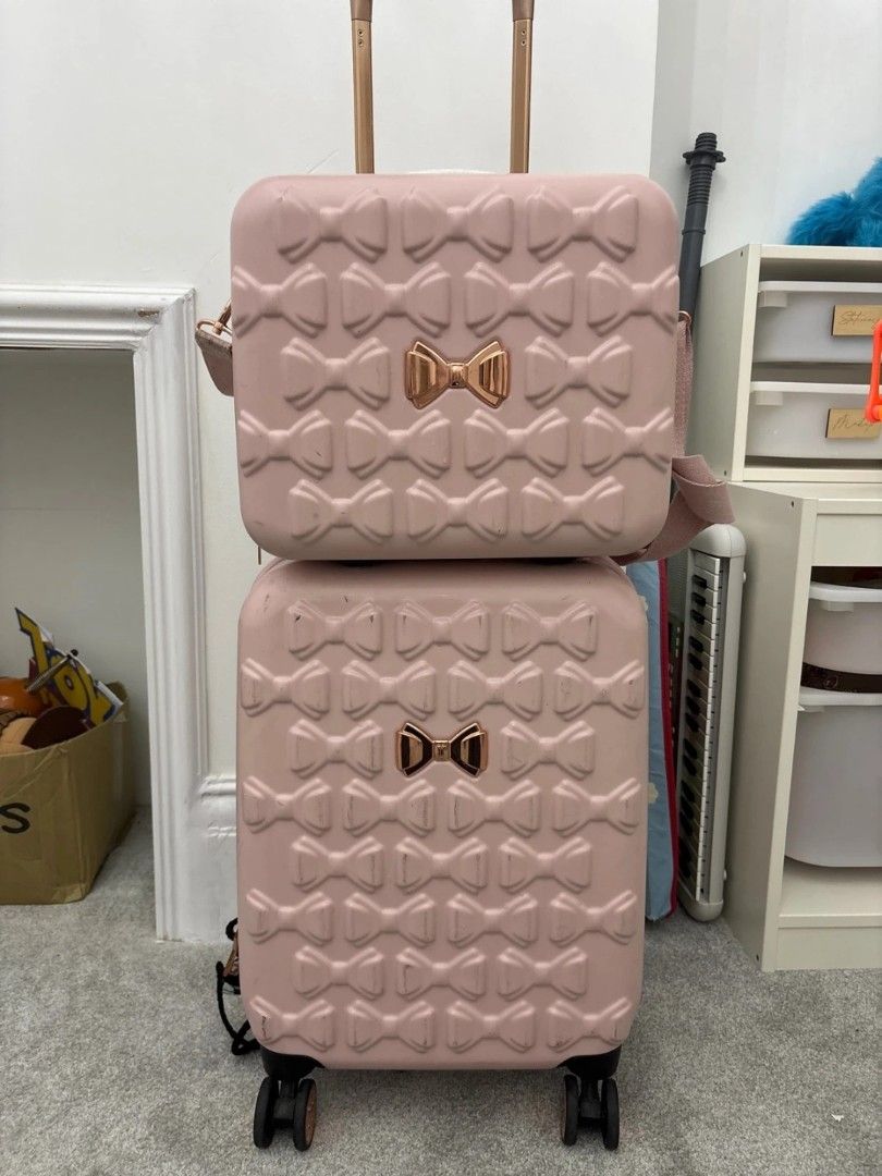 Ted Baker Bow Detail Luggage Set- Pink (Category: Luxury Bags & Wallets) located in Baguio. Submitted by pinkberrylizzz (Listing ID 1431525293, Image 1). Description: RARE Pink Ted Baker Cabin and Vanity Case **used and will show signs of use. Already started cleaning it and will clean a bit more but manage your expections. Still very pretty and have lots of life left. The cabin size handle already worn out but should be a quick fix in bag repair