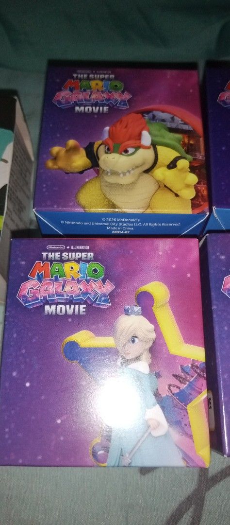 The Super Mario Bros. Movie Figures Bundle (Category: Figurines & Statues) located in Bacoor. Submitted by qualityucantrust (Listing ID 1431541062, Image 2). Description: - Collectible figures from The Super Mario Bros. Movie. - Characters include Yoshi, Bowser, and Rosalina. - Each figure comes in its original box. - Perfect for fans and collectors. - Great for display or as gifts. - Boxes feature vibrant movie artwork. FIX PRICE SUREBUYER SHOUL