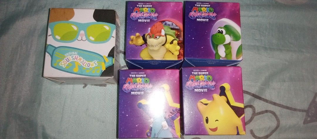 The Super Mario Bros. Movie Figures Bundle (Category: Figurines & Statues) located in Bacoor. Submitted by qualityucantrust (Listing ID 1431541062, Image 3). Description: - Collectible figures from The Super Mario Bros. Movie. - Characters include Yoshi, Bowser, and Rosalina. - Each figure comes in its original box. - Perfect for fans and collectors. - Great for display or as gifts. - Boxes feature vibrant movie artwork. FIX PRICE SUREBUYER SHOUL