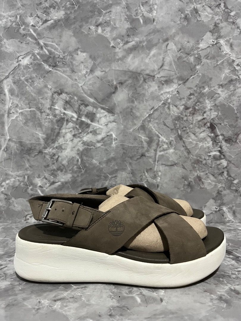 Timberland Sandals (Category: Flats & Sandals) located in Davao. Submitted by twistedswagger (Listing ID 1431433456, Image 1). Description: - Timberland sandals with cross-strap design - Size: 7W - Sole: White - Tread: Brown - Made in Bangladesh - Timberland logo on insole and sole.