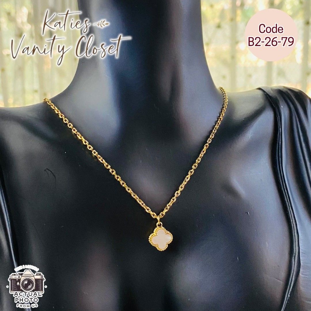 VAN CLEEF & ARPELS CLOVER NECKLACE - SMALL PENDANT MINIMALIST NECKLACE - CODE B22679 (Category: Necklaces) located in Rizal. Submitted by vickypeiwanggo (Listing ID 1431558071, Image 3). Description: The necklace in the image is a white clover pendant necklace, heavily inspired by the iconic Van Cleef & Arpels Alhambra collection. This specific version appears to be a mother-of-pearl or white enamel inlay set in a gold-toned beaded frame. Key Fea