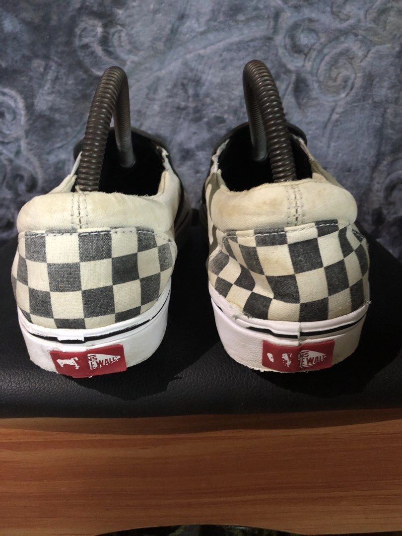Vans Checkerboard Slip-On Sneakers (Category: Sneakers) located in Manila. Submitted by blufinds (Listing ID 1431410886, Image 3). Description: - Classic Vans slip-on style - Black and white checkerboard pattern - White sole - Vans logo detail - Well-maintained condition - Stylish and versatile.