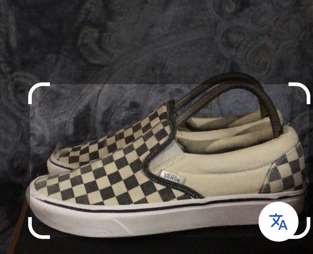 Vans Checkerboard Slip-On Sneakers (Category: Sneakers) located in Manila. Submitted by blufinds (Listing ID 1431410886, Image 1). Description: - Classic Vans slip-on style - Black and white checkerboard pattern - White sole - Vans logo detail - Well-maintained condition - Stylish and versatile.