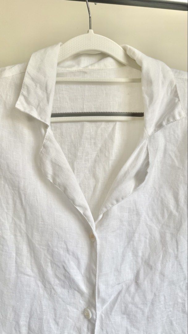 White Linen Short Sleeve Shirt (Category: Shirts) located in Batangas. Submitted by hello.wearagain__ (Listing ID 1431430872, Image 3). Description: - Linen short sleeve shirt - Collared neckline - Button-down closure - Relaxed fit - Perfect for casual wear - Textured fabric.