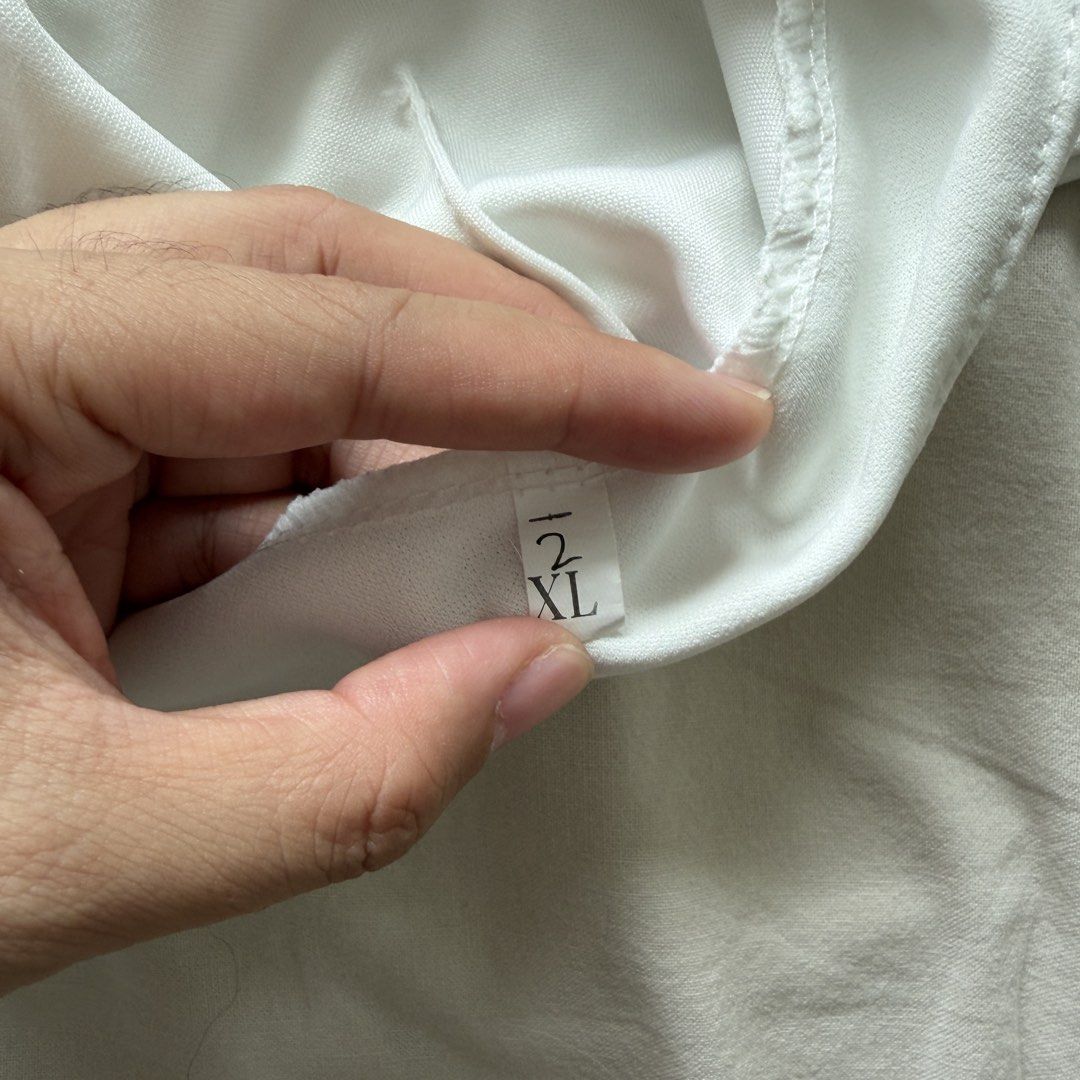 White Skort - Size 2XL (Category: Shorts) located in Quezon City. Submitted by quackstack (Listing ID 1431448824, Image 3). Description: - White skort - High-waisted - Size: 2XL, fits waist 28-31 - Back zipper - Front split detail.