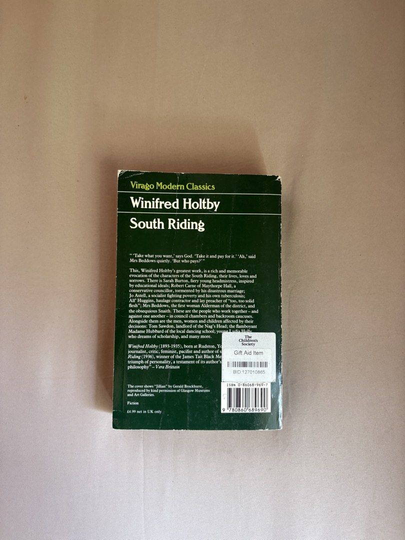 Winifred Holtby South Riding (Category: Storybooks) located in Santa Rosa. Submitted by annesclosetgw (Listing ID 1431499896, Image 2). Description: - Winifred Holtby's 'South Riding' (Virago Modern Classics). - Features a portrait on the cover. - Green spine. - Includes a summary and author information on the back..