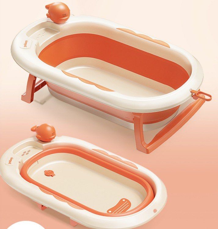 Yoboo Foldable Baby Bathtub (Category: Bathtub & Bath Accessories) located in Quezon City. Submitted by kryshnanzyanna (Listing ID 1431533375, Image 1). Description: - Yoboo foldable baby bathtub - Color: Orange and white - Includes whale-shaped water scoop - Folds flat for easy storage - Perfect for travel.