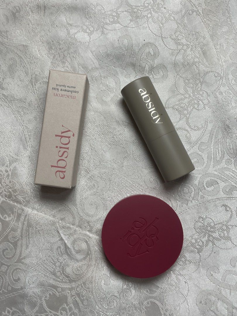 Absidy Macaron Lipstick & Soft Cheek Velvet Blush (Category: Makeup) located in Abucay. Submitted by declutterwyana (Listing ID 1431666786, Image 1). Description: - Absidy Macaron Cashmere Kiss Matte Lipstick (C227R) - Matte finish, brand new. - Soft Cheek Velvet Blurring Powder Blush - Deep pink shade, brand new. - Both items are in original packaging..