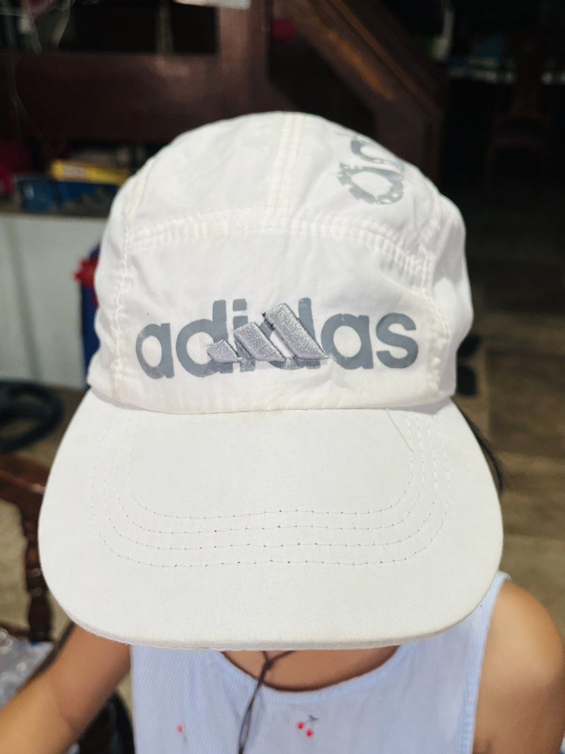 Adidas Adicolor Five-Panel Cap (Category: Caps & Hats) located in Mandaue City. Submitted by chuchi152615 (Listing ID 1431726405, Image 3). Description: - White Adidas cap - Adidas logo on front and side - Curved brim - Adjustable strap - Lightweight material.