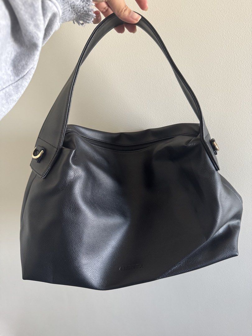 Amreta Mini Lyan Black Shoulder Bag (Category: Shoulder Bags) located in Manila. Submitted by anmcabs (Listing ID 1431637602, Image 1). Description: - Amata black shoulder bag - Spacious interior - Zippered pocket and additional compartments - Single shoulder strap - Gold-colored hardware - Brown interior lining - Textured exterior material -comes with cross body strap - only used twice bought for 1534 php on shoppee, selling for 1400! .