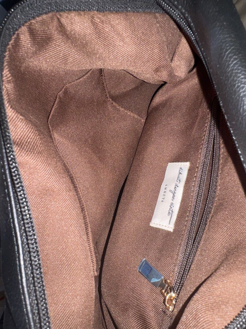 Amreta Mini Lyan Black Shoulder Bag (Category: Shoulder Bags) located in Manila. Submitted by anmcabs (Listing ID 1431637602, Image 3). Description: - Amata black shoulder bag - Spacious interior - Zippered pocket and additional compartments - Single shoulder strap - Gold-colored hardware - Brown interior lining - Textured exterior material -comes with cross body strap - only used twice bought for 1534 php on shoppee, selling for 1400! .