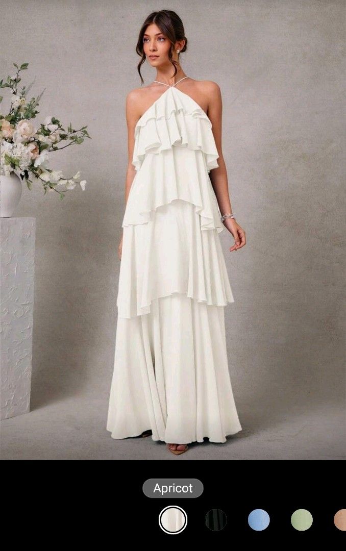 Apricot Ruffled Halter Maxi Dress (Category: Dresses) located in Quezon City. Submitted by cdm19 (Listing ID 1431789057, Image 1). Description: - Apricot maxi dress - Halter neckline - Layered ruffle bodice - Flowing, floor-length skirt - Delicate tie-back detail - Perfect for special occasions.