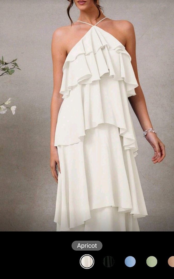 Apricot Ruffled Halter Maxi Dress (Category: Dresses) located in Quezon City. Submitted by cdm19 (Listing ID 1431789057, Image 3). Description: - Apricot maxi dress - Halter neckline - Layered ruffle bodice - Flowing, floor-length skirt - Delicate tie-back detail - Perfect for special occasions.