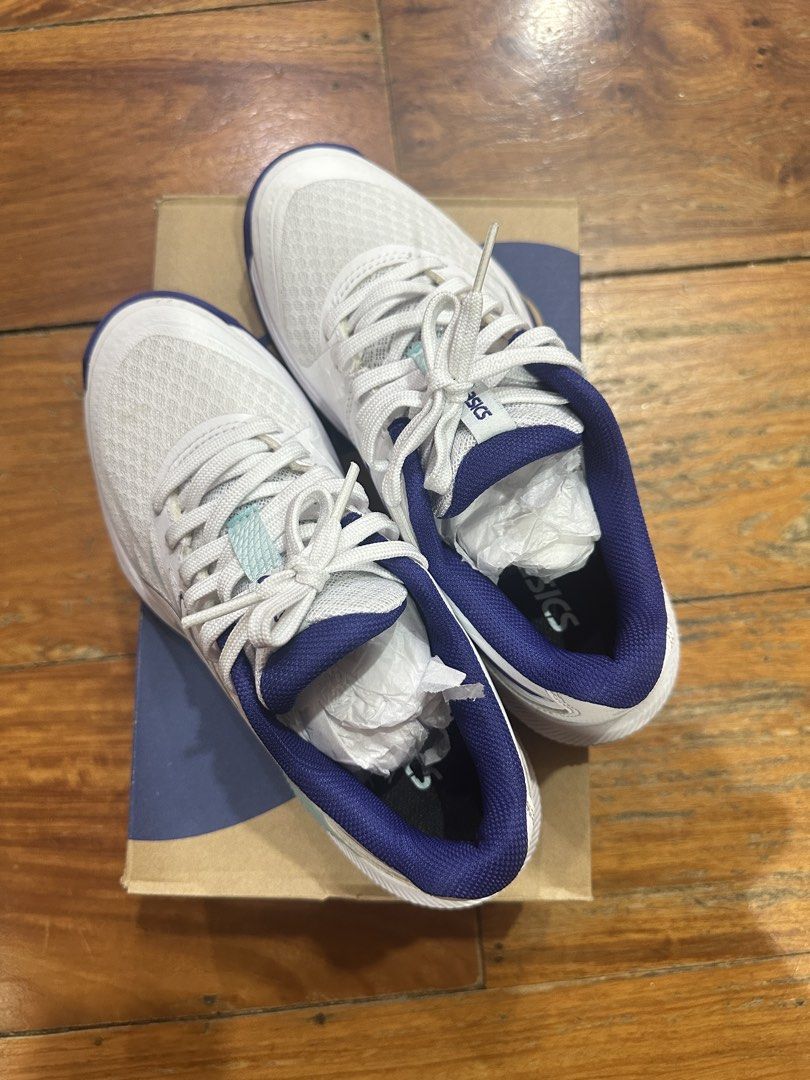 Asics Gel-Tactic 12 coloway white/eggplant (Category: Sneakers) located in Manila. Submitted by bueleboutique (Listing ID 1431674487, Image 3). Description: Size says best fit US 5.5 but will fit more if you are not wide feet (best fit US 4-5) Perfect for court indoor sports Used once With box With slight stain see photo but not that visible.