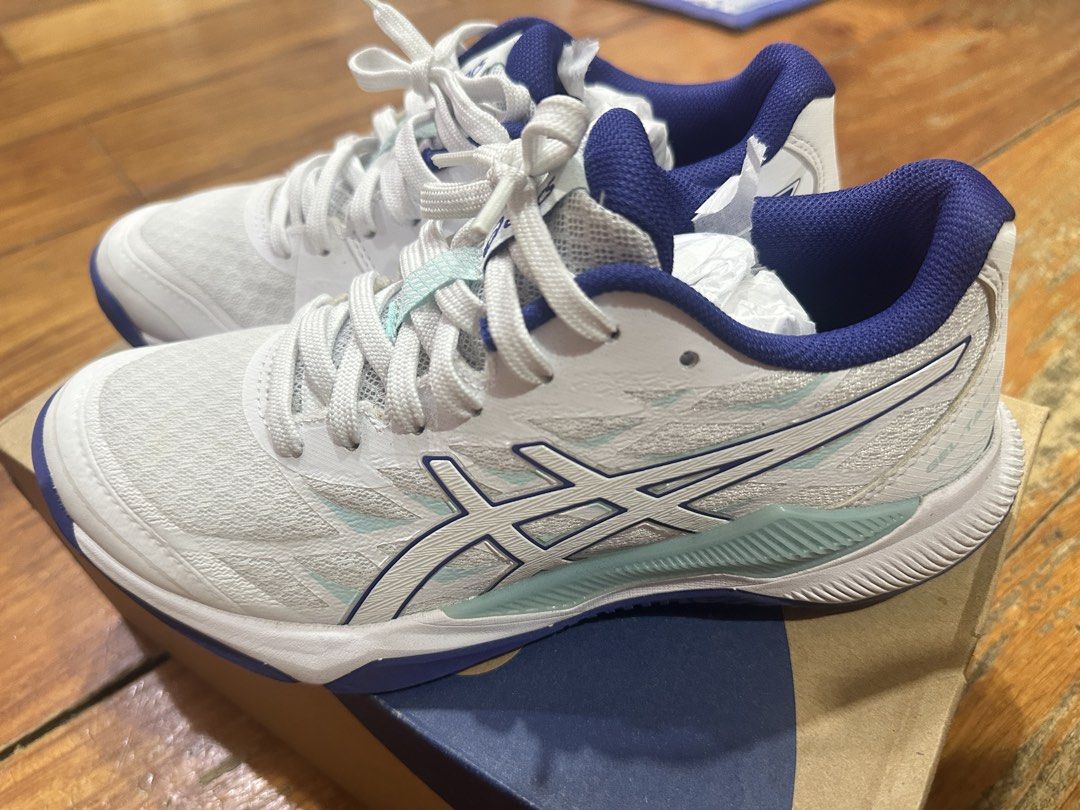 Asics Gel-Tactic 12 coloway white/eggplant (Category: Sneakers) located in Manila. Submitted by bueleboutique (Listing ID 1431674487, Image 2). Description: Size says best fit US 5.5 but will fit more if you are not wide feet (best fit US 4-5) Perfect for court indoor sports Used once With box With slight stain see photo but not that visible.