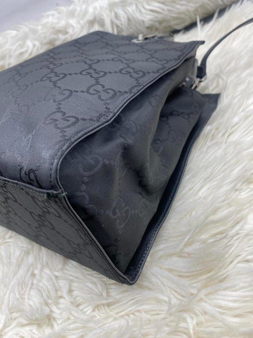 Authentic Gucci Bamboo GG Canvas Tote (Category: Luxury Bags & Wallets) located in Quezon City. Submitted by arleeeneb (Listing ID 1431716631, Image 3). Description: • Material: Durable Black Nylon GG Canvas • Handles: Genuine Natural Bamboo • Size: 30cm x 24cm (The perfect daily size!) • Condition: Good vintage condition. ✨ Lifetime money-back guarantee. ✨ Buy with confidence. ✨ DM for more photos or to checkout!.