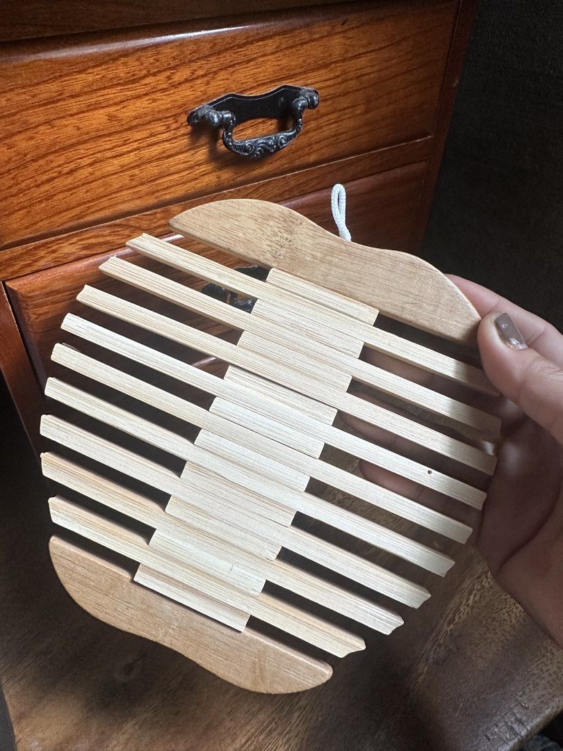 Bamboo wood trivet (Category: Other Kitchenware & Tableware) located in Davao. Submitted by favoritepreloved (Listing ID 1431615572, Image 1). Description: ❤️ 15cm x 15cm.