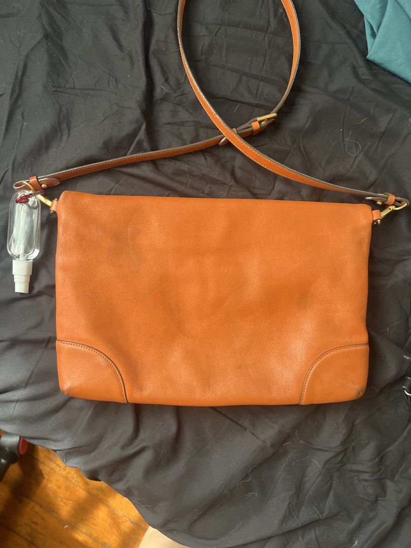 Beanpole Leather Convertible sling Shoulder Bag (Category: Shoulder Bags) located in Makati City. Submitted by tilli28 (Listing ID 1431576942, Image 2). Description: - Brand: Beanpole - Style: Leather Shoulder Bag - Color: Orange - Features: Top handle, detachable shoulder strap - Closure: Zipper - Hardware: Gold-tone - Design: Sleek and spacious - Additional: Front flap with magnetic closure. Ideal for everyday use..