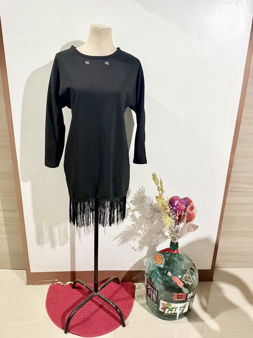 Black Fringe Dress (Category: Sleeveless) located in Caloocan City. Submitted by dddddddddddeclutter (Listing ID 1431756391, Image 1). Description: - Black top - Fringe detail at hem - Round neckline with metal accents - 3/4 sleeves - Loose fit - Ideal for casual wear.