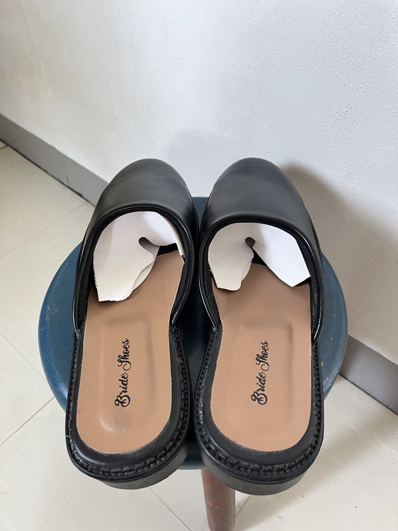Black Leather Mules (Category: Dress Shoes) located in Las Pinas. Submitted by solfits (Listing ID 1431606639, Image 2). Description: [brand new] black synthetic leather mules * haven't worn them outside * size 44 (27cm) * glue/adhesive aren't that neat (brought from an indonesian brand on 🍊) * overall condition is great * no box inclusion.