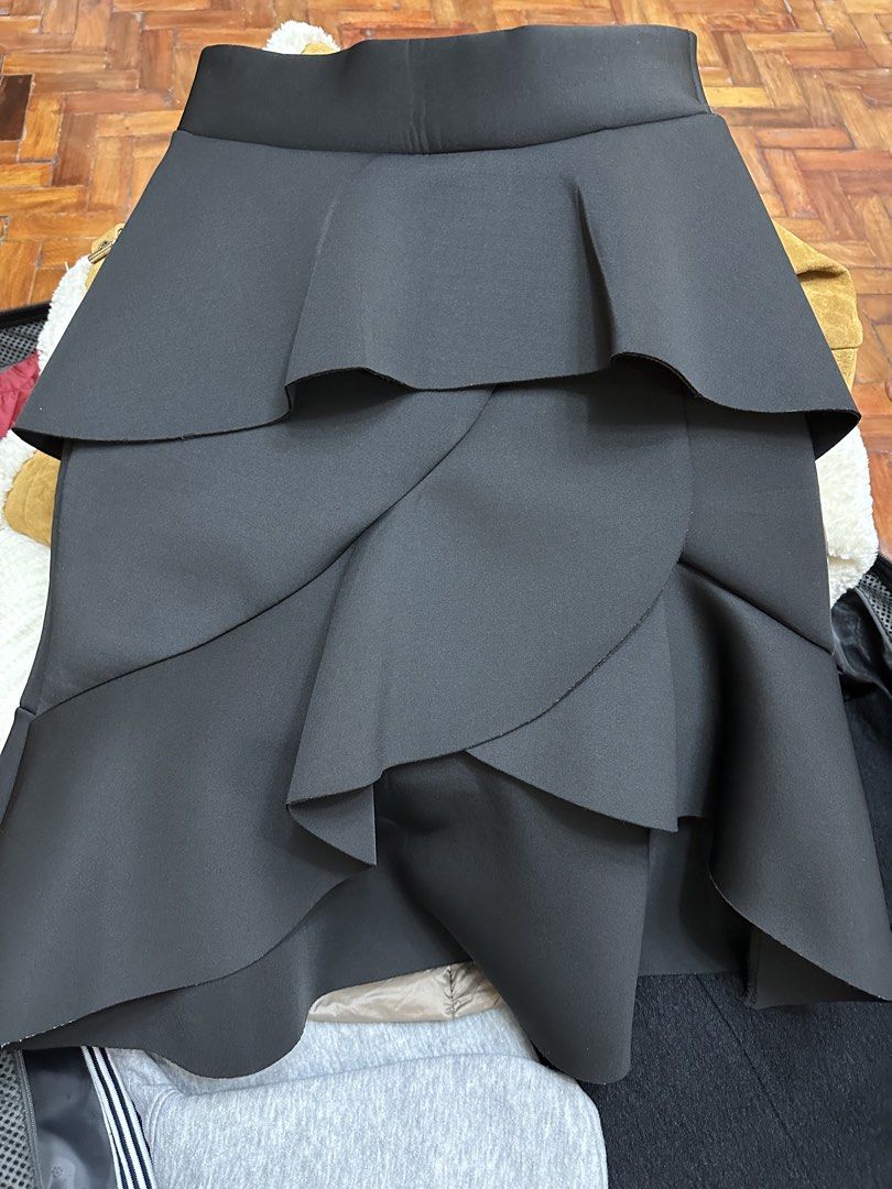 Black Shiny Asymmetrical Midi Skirt (Category: Skirts) located in Manila. Submitted by secondhavenph (Listing ID 1431622610, Image 1). Description: .