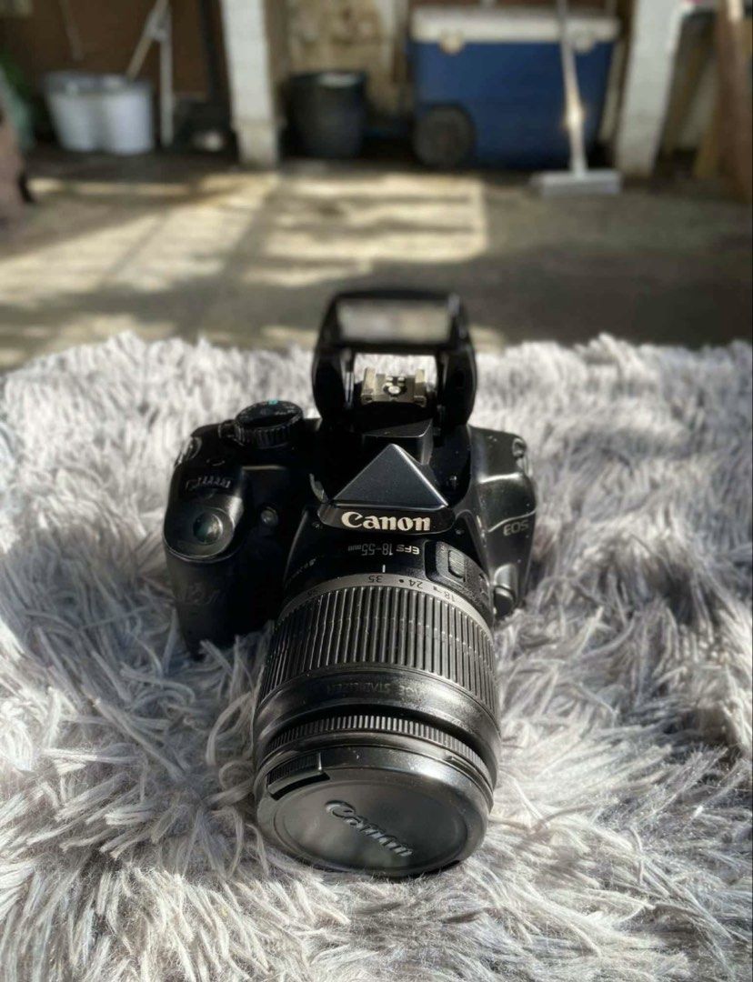 CANON EOS 1000D (Category: Cameras) located in Manila. Submitted by ascndntmnl (Listing ID 1431688778, Image 2). Description: Most budget professional DLSR Camera that you can buy especially if you know how to color grade Rfs: decluttering.