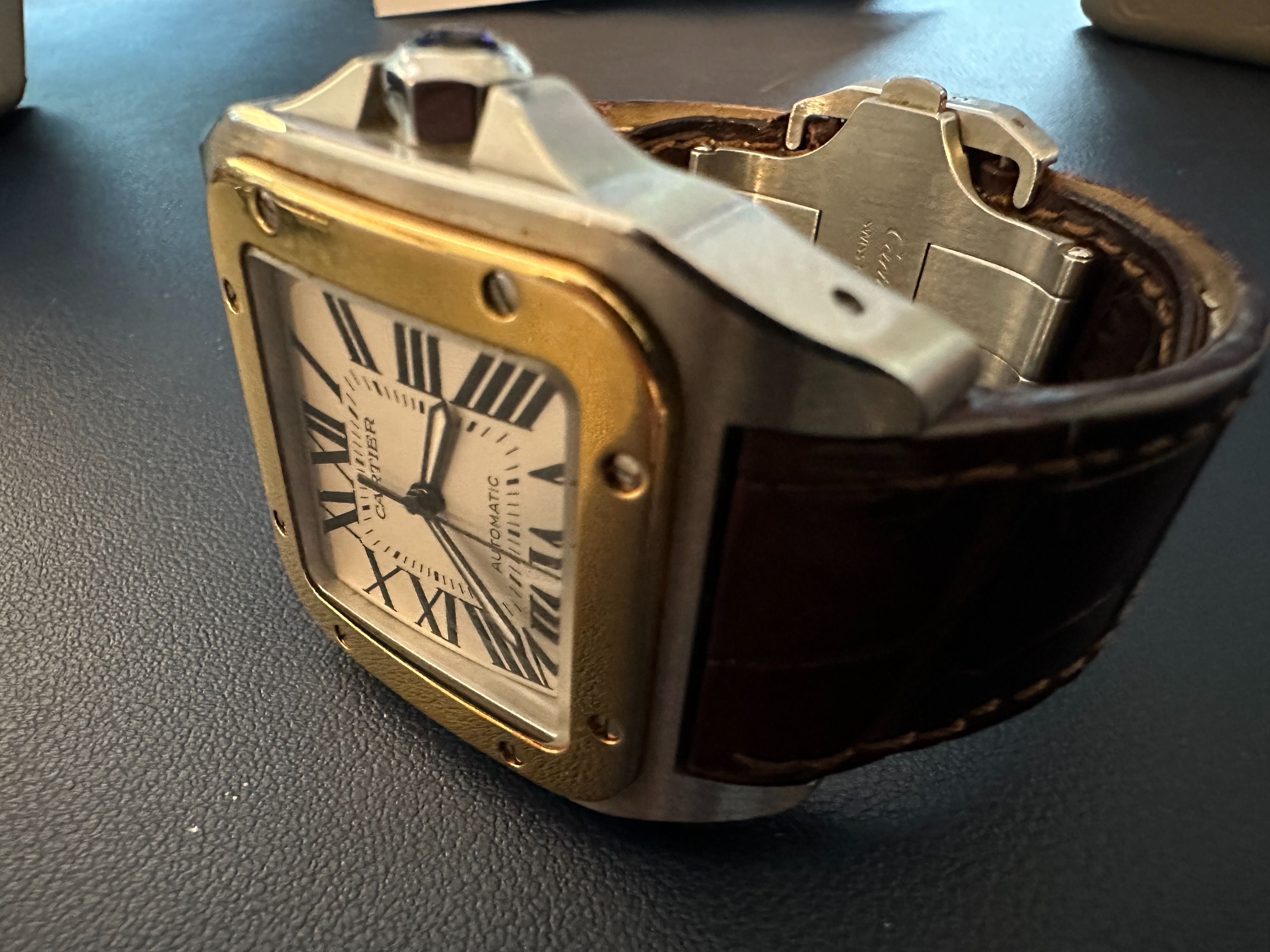 Cartier Santos 100 XL W20072X7 – Full Set – Mint Condition – Santos XL – From Horological Restorations (Category: Watches) located in Singapore. Submitted by maxhogg-02674 (Listing ID 1431683440, Image 2). Description: Description One of Cartier's most enduring designs, the Santos 100 XL is a discontinued reference that has become increasingly difficult to find in original, unpolished condition — and rarer still as a complete set. This 2006 examp