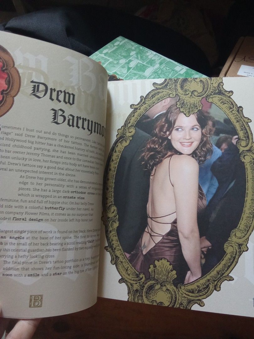 Celebrity Tattoos Book (Category: Storybooks) located in Pasig City. Submitted by teebeedeee (Listing ID 1431612696, Image 2). Description: - Discover celebrity tattoos in this book! - Features an A-Z of A-list body art. - Includes 16 exclusive temporary tattoos. - Over 100 color photographs. - Stories behind the tattoos are included. - Features celebrities like Angelina, Pamela, Johnny, and Ozzy. preowned authentic softcover copy complete full c